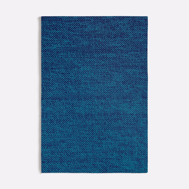 Dark turquoise textile swatch with a dense, finely mottled blue-green woven texture