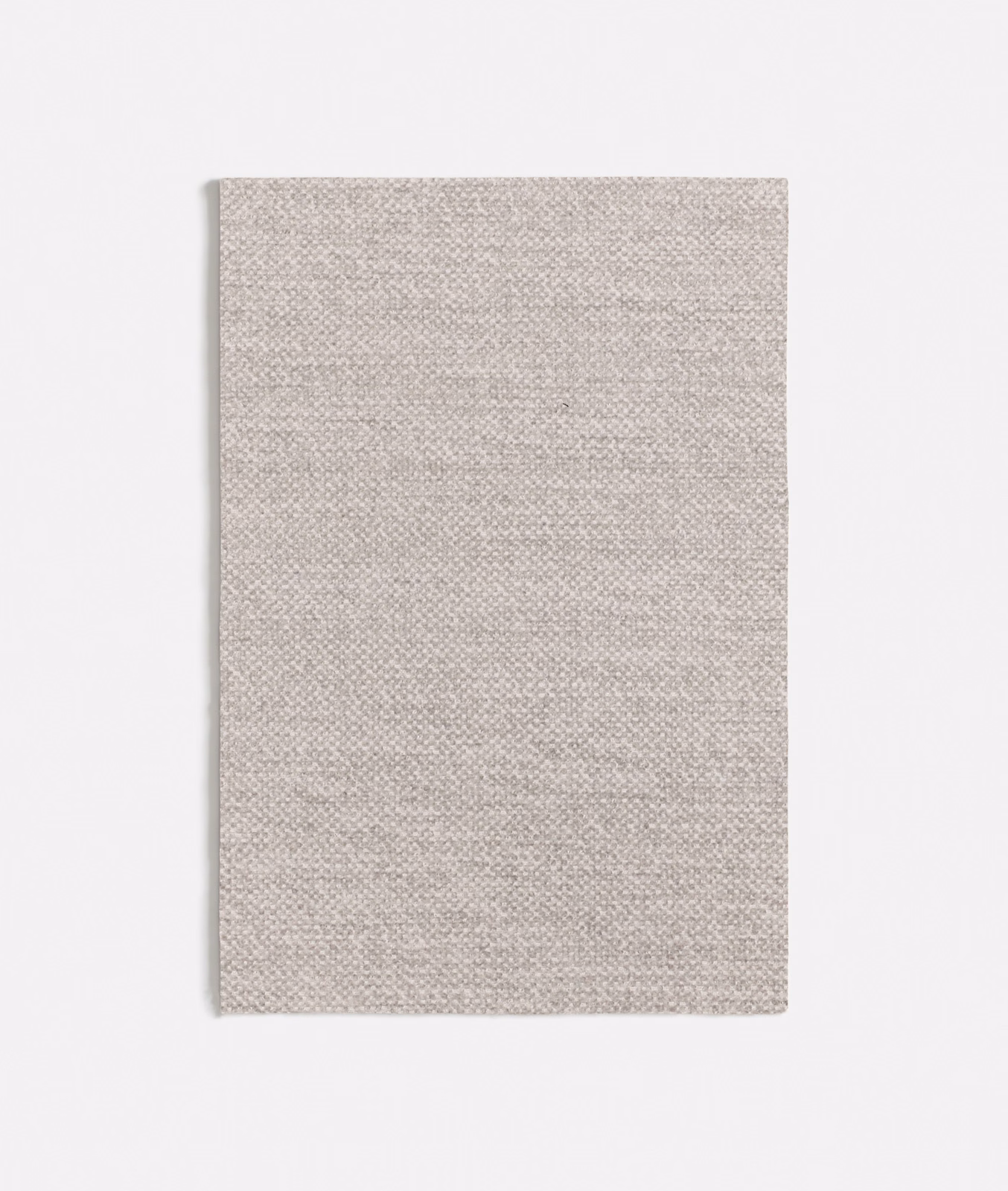 Pale greige-grey fabric swatch with a fine, subtly flecked woven texture
