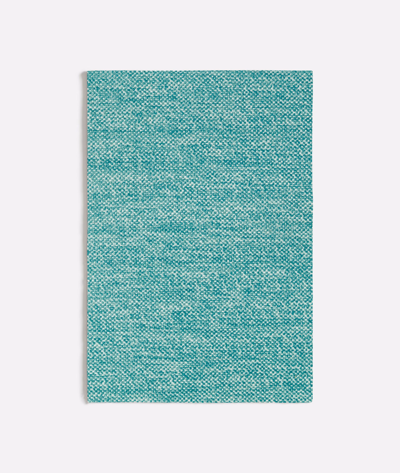Close-up of cool turquoise woven fabric with fine aqua flecks and subtle horizontal texture