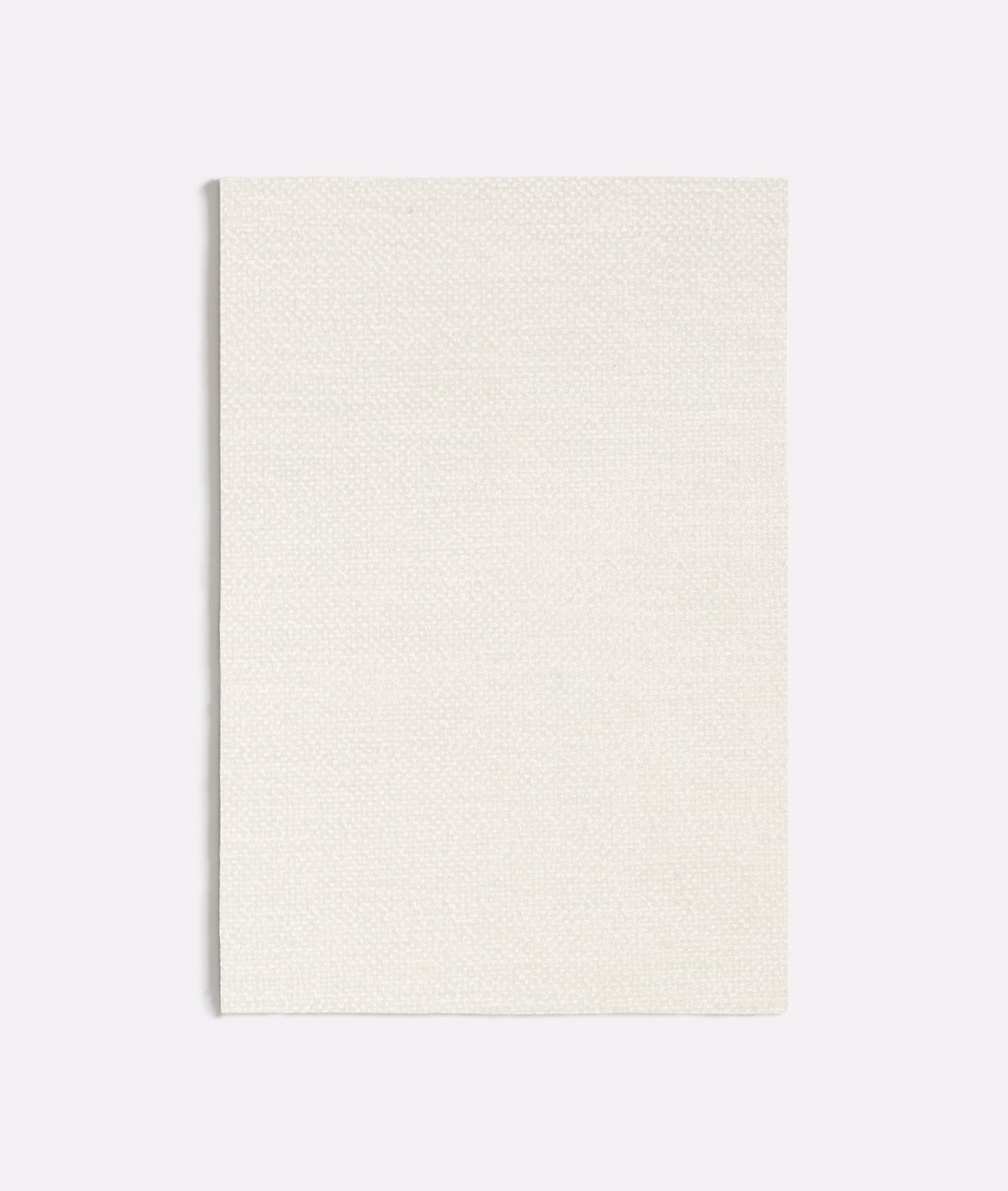 Pale ivory Lucrezia White swatch showing a fine, even woven texture