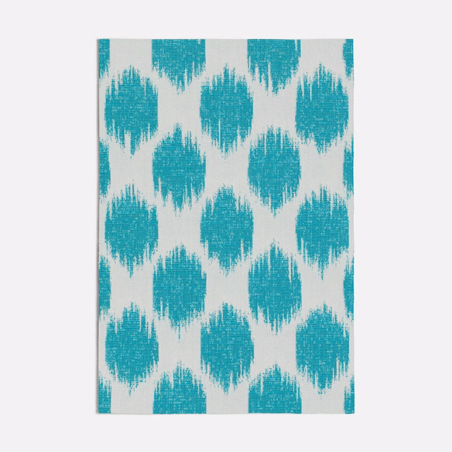 Turquoise and ivory ikat diamonds with a softly brushed woven texture