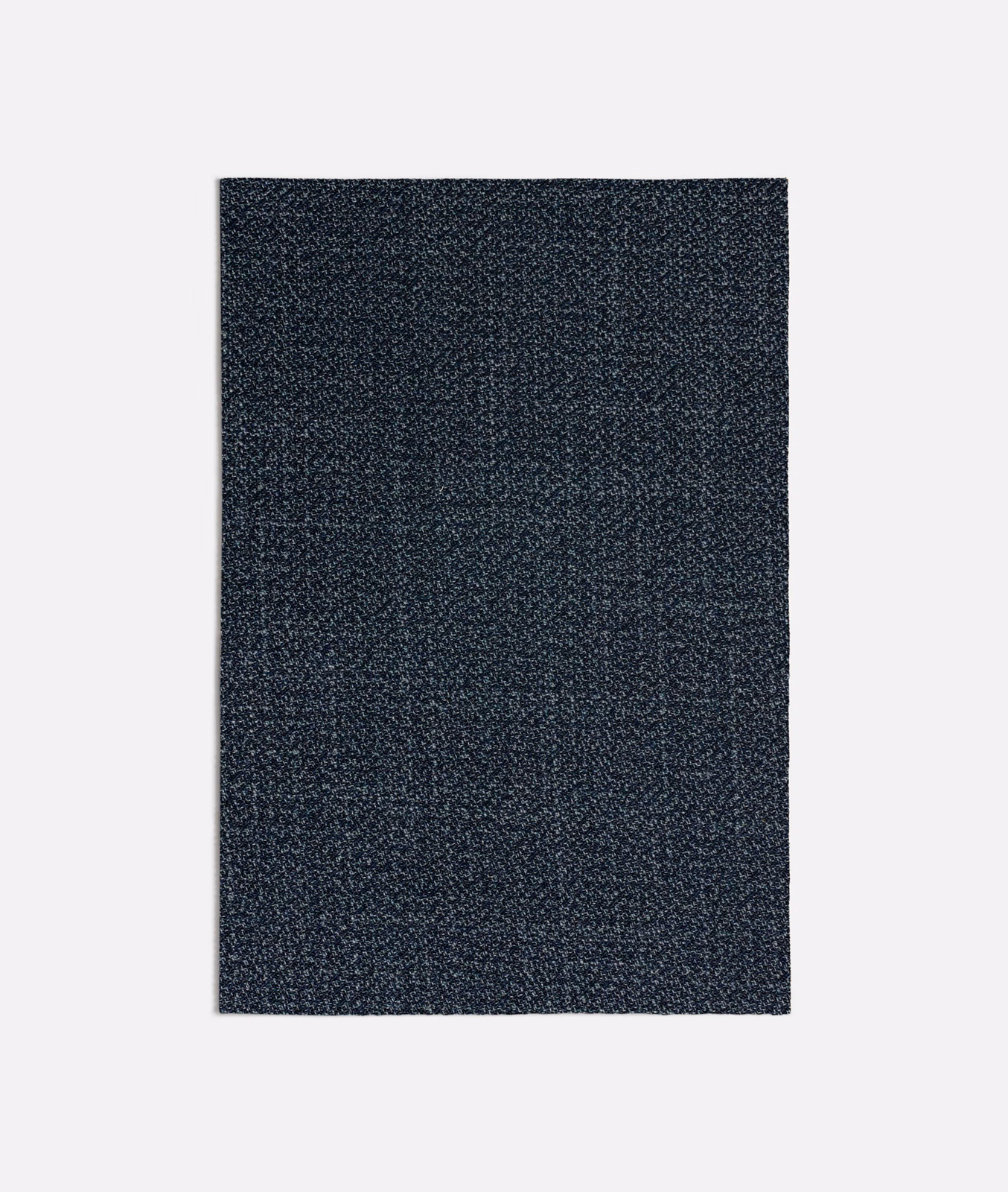 Deep blue-charcoal woven swatch with fine pale flecking and granular texture