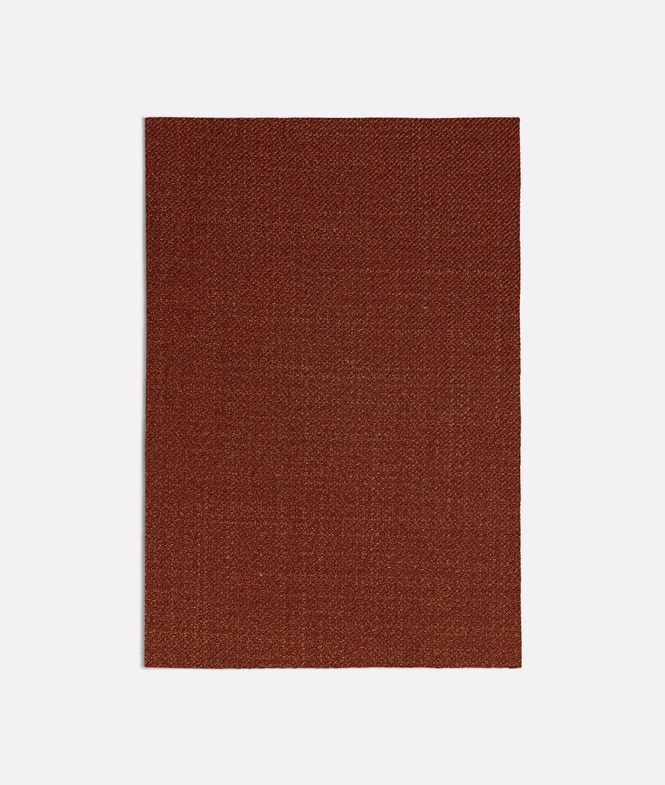 Deep russet terracotta fabric swatch with a fine, subtly textured woven surface