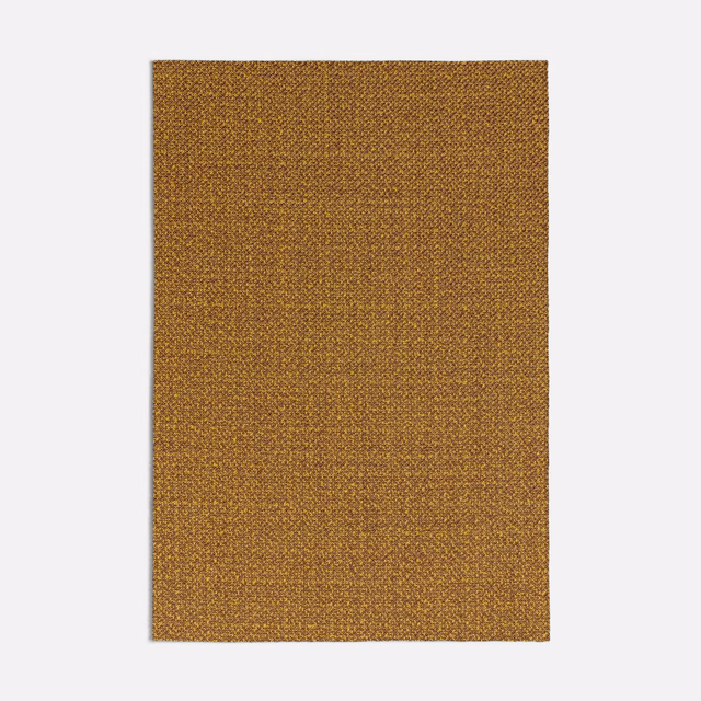 Warm marigold terracotta close-weave fabric with subtly flecked ochre texture