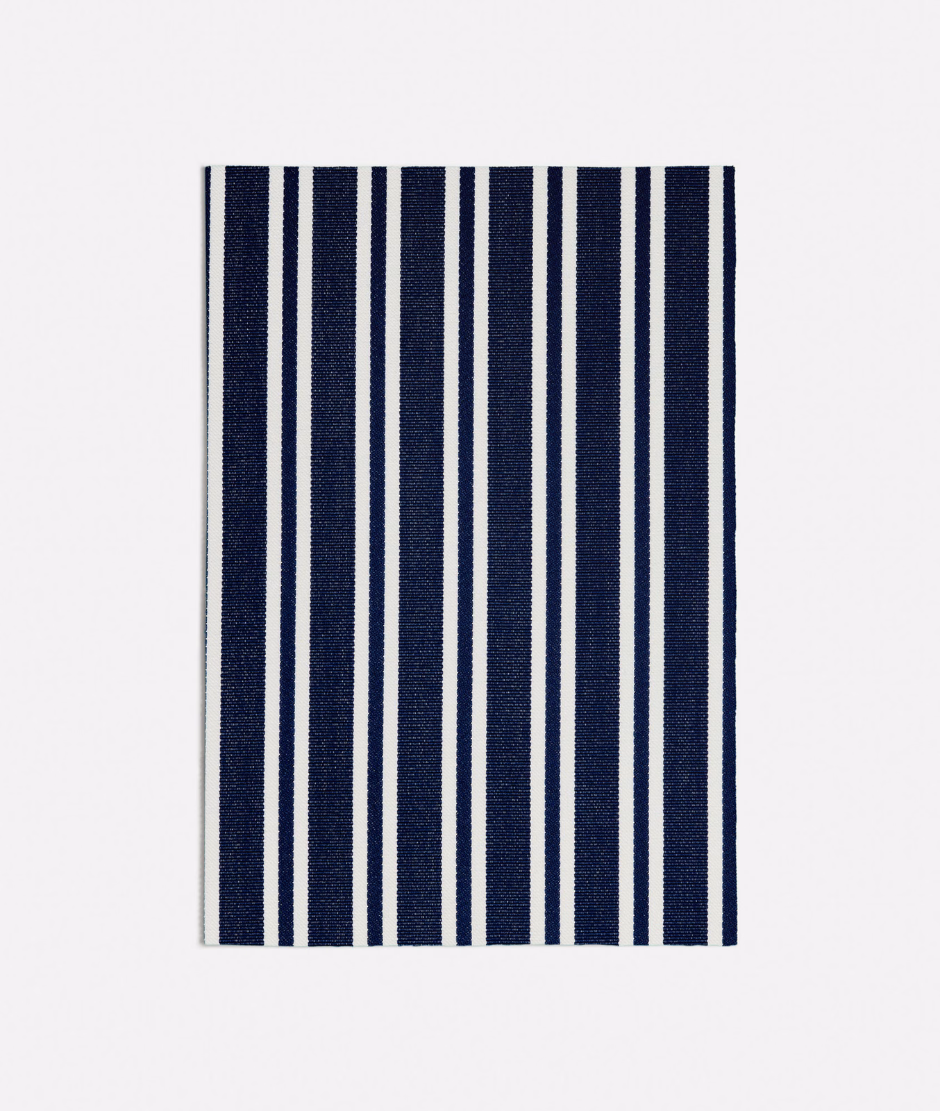 Deep navy and ivory vertical stripe fabric with a fine woven texture