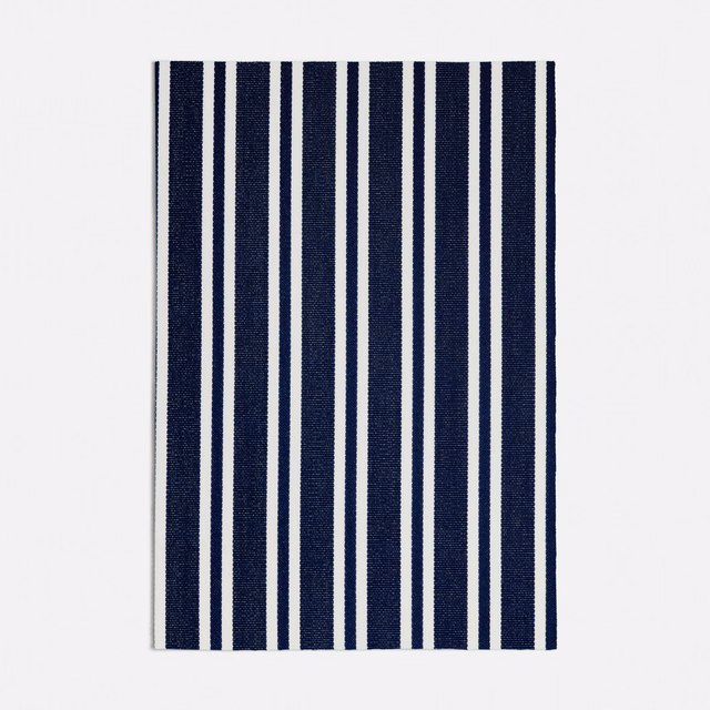 Deep navy and ivory vertical stripe fabric with a fine woven texture