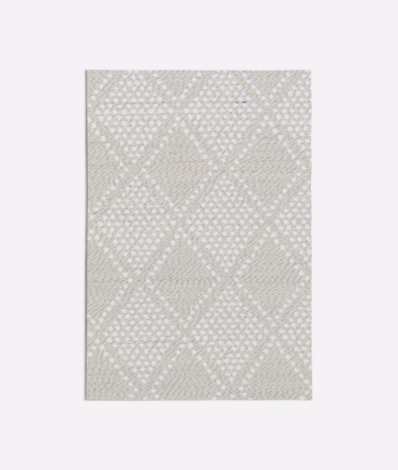Pale cool grey woven swatch with soft diamond lattice and fine texture