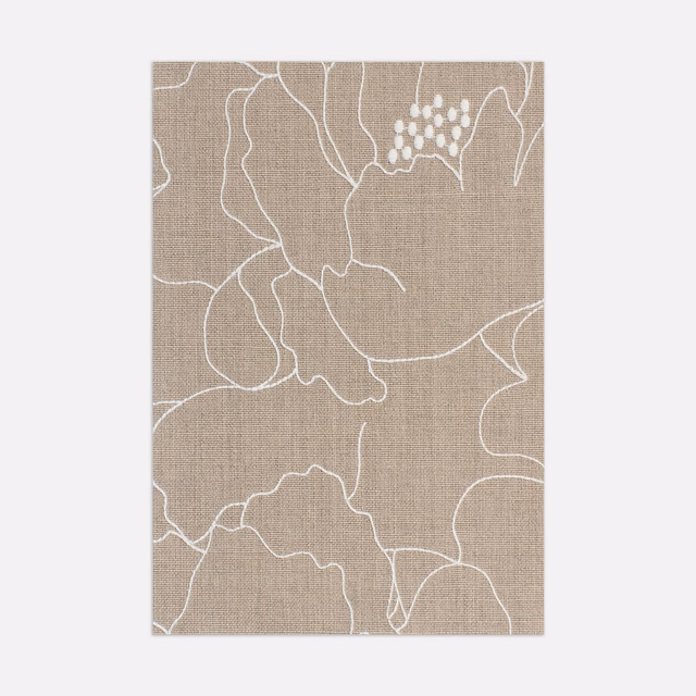Warm taupe woven fabric with large ivory outlined flowers and clustered botanical detail