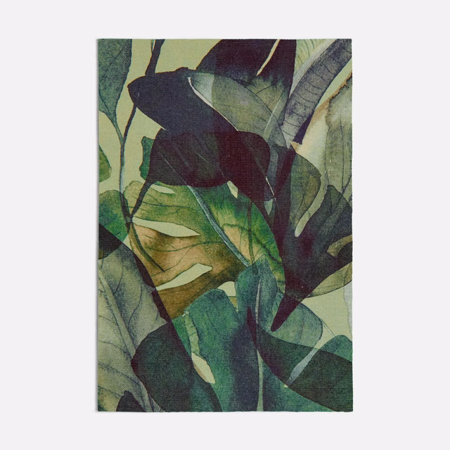 Monstera Green fabric showing overlapping dark leaves with olive and muted sage foliage