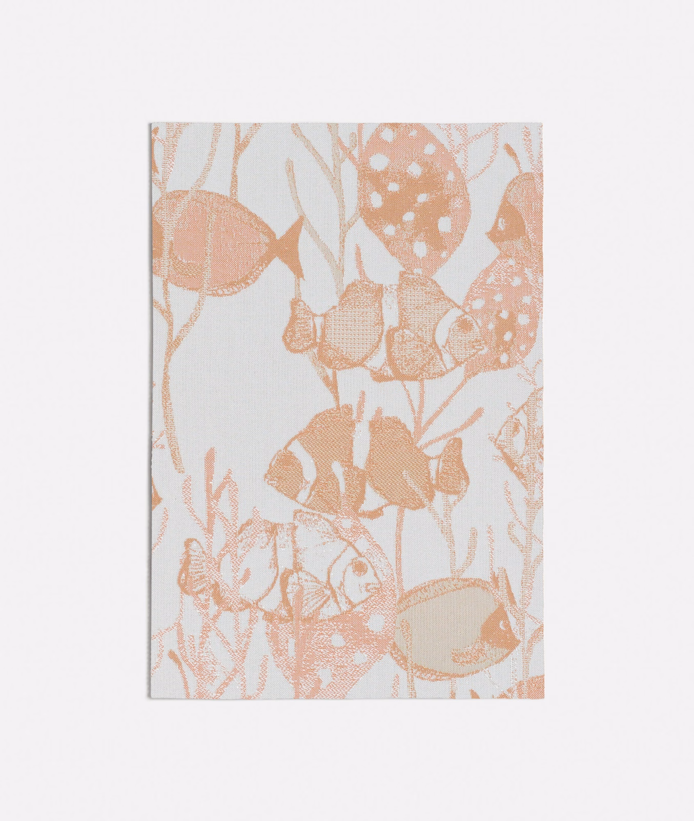 Peach woven textile with coral fish, bubbles and branching aquatic motifs