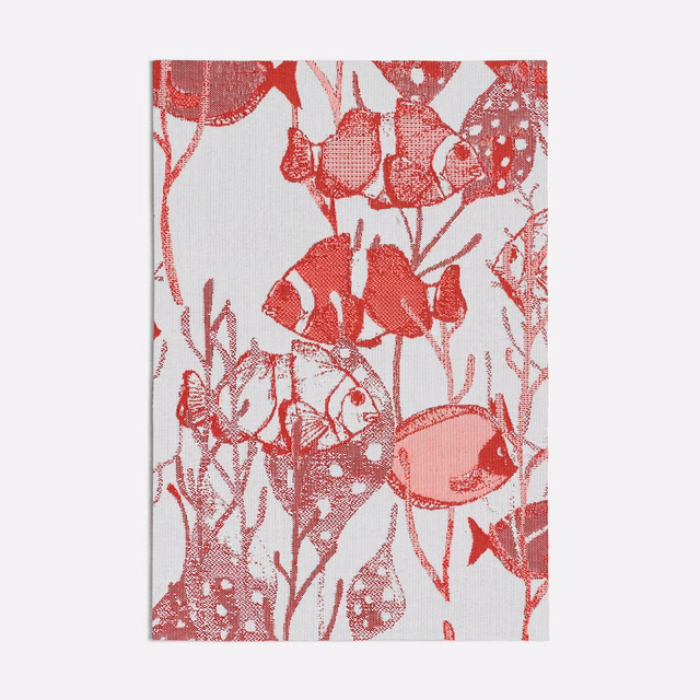 Crimson botanical stems and flower heads on a pale grey textile ground