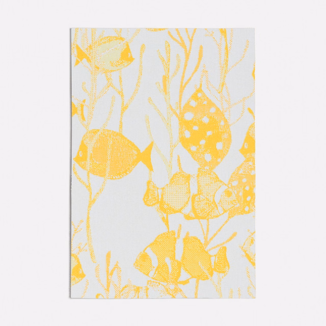 Lemon-yellow fish and seaweed motifs on a pale grey fabric ground