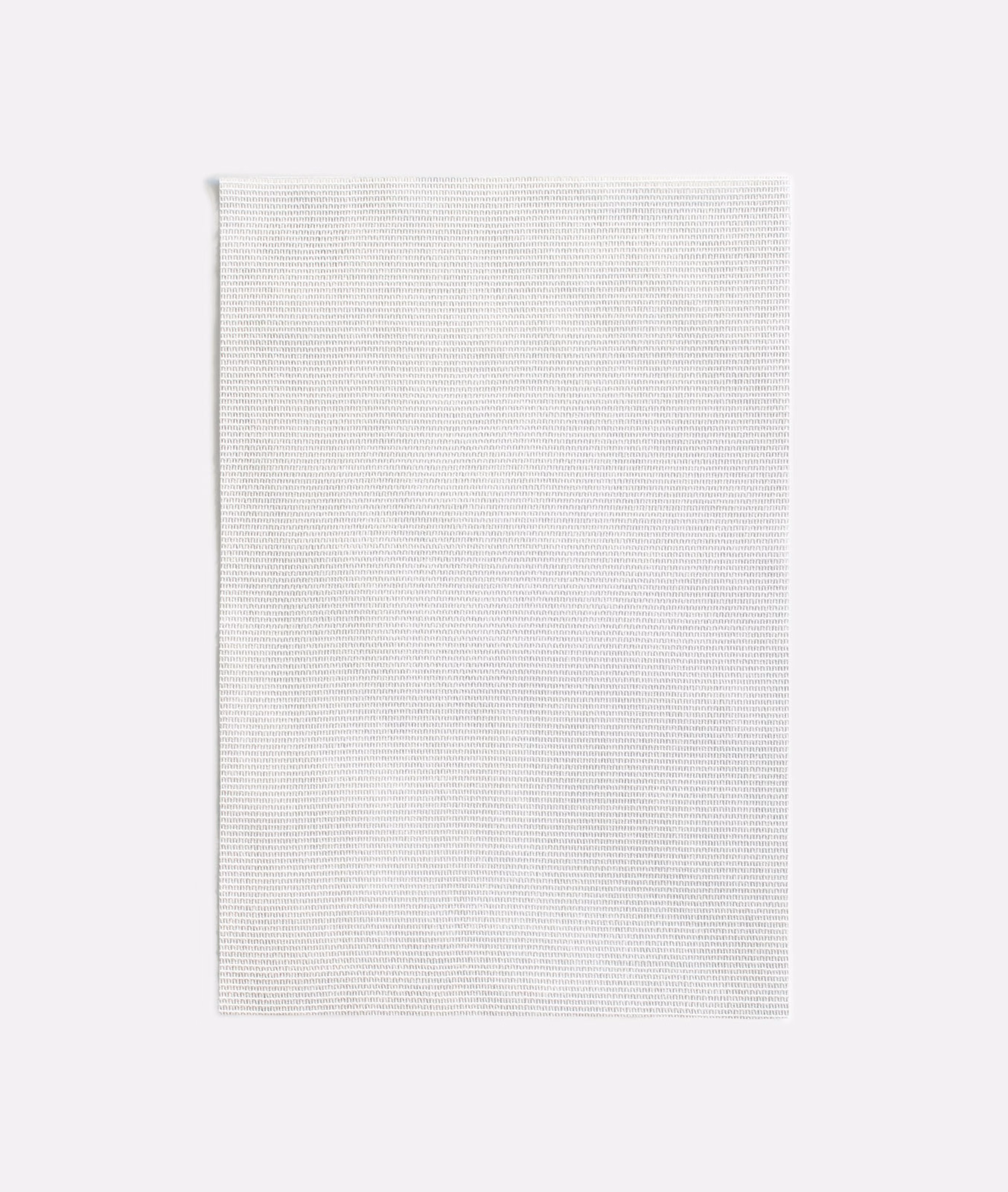 Fine white textile swatch with closely spaced horizontal ribbed lines