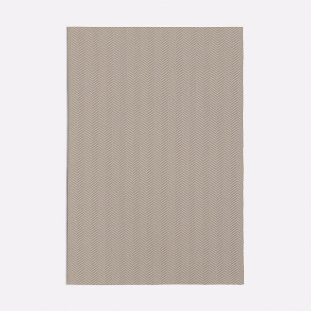 Olmo Beige swatch showing taupe-beige fabric with subtle vertical ribbing