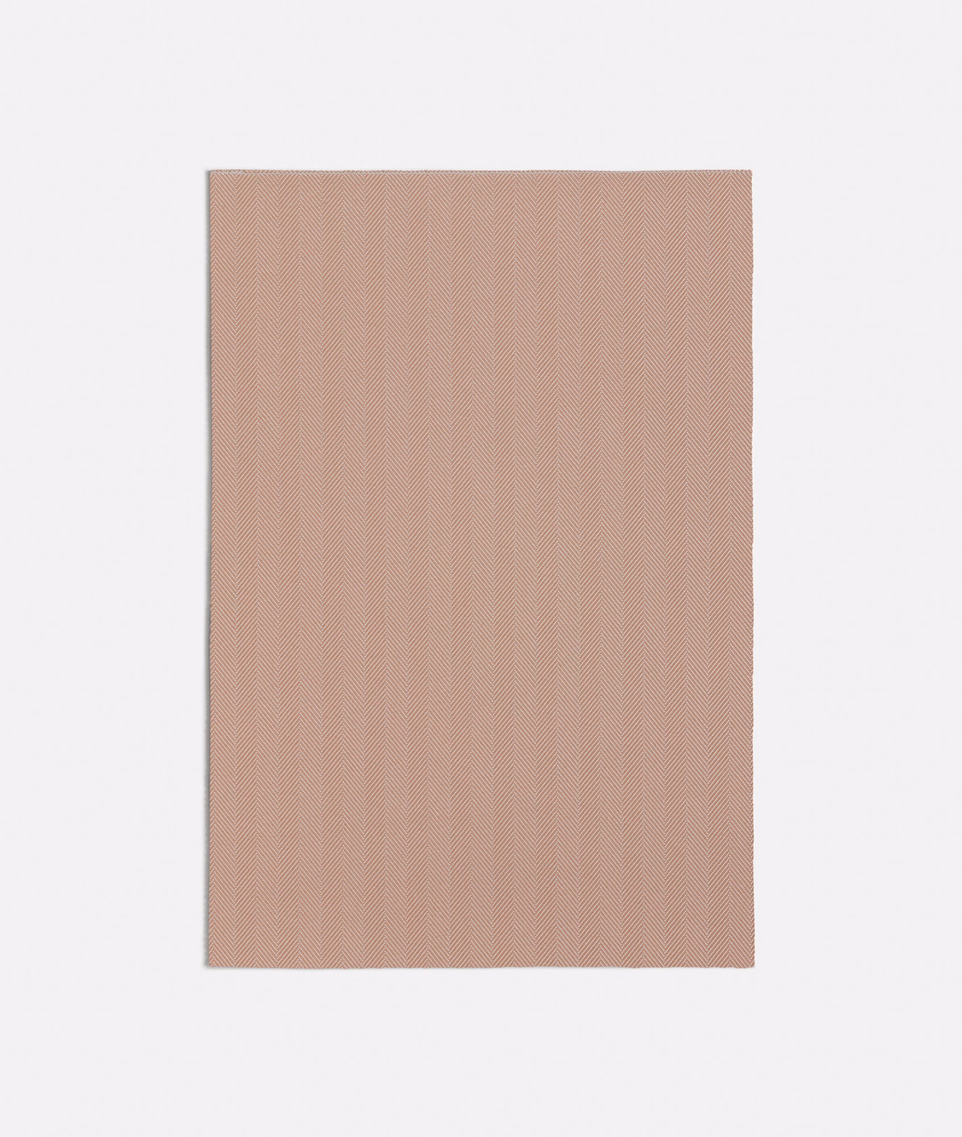 Dusty peach fabric swatch with a fine, softly ribbed vertical texture