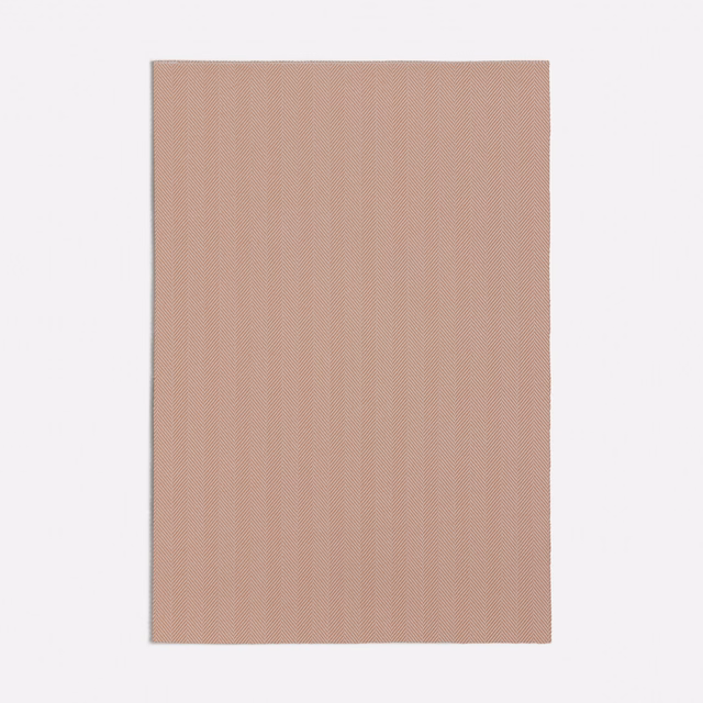 Dusty peach fabric swatch with a fine, softly ribbed vertical texture