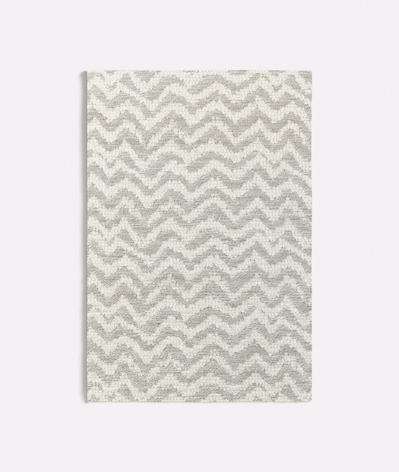 Pale cool-grey and ivory woven swatch with closely spaced zigzag waves