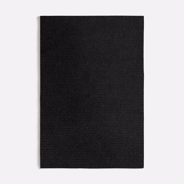 Near-black Palermo fabric swatch with fine horizontal ribbing and a dense woven texture