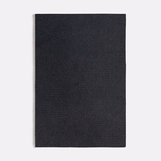 Deep charcoal grey fabric swatch with fine horizontal ribbed weave and subtle tonal depth