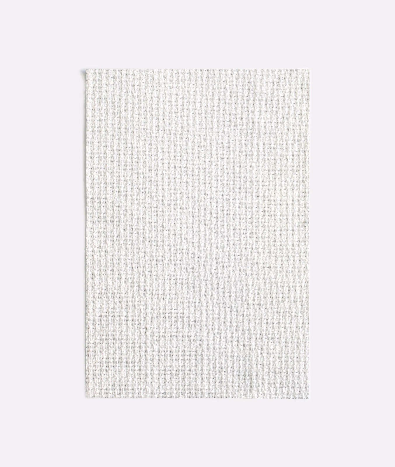 Soft white Palmilla fabric swatch showing a fine, even woven texture