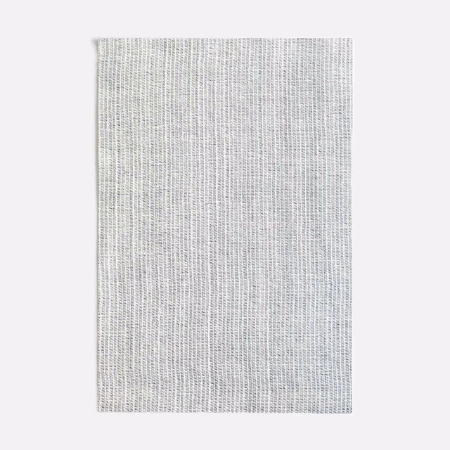 Cool pale-grey woven swatch with fine vertical ribs and subtle slub texture
