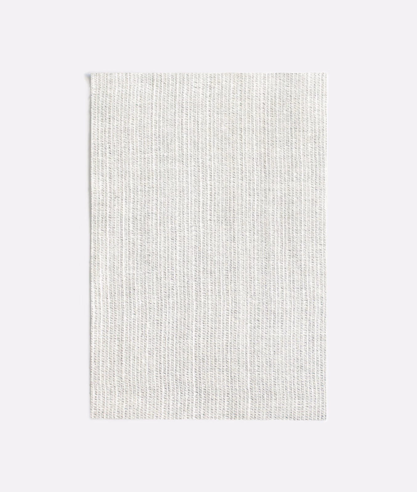Cool pale grey fabric with a fine vertical weave and softly flecked texture