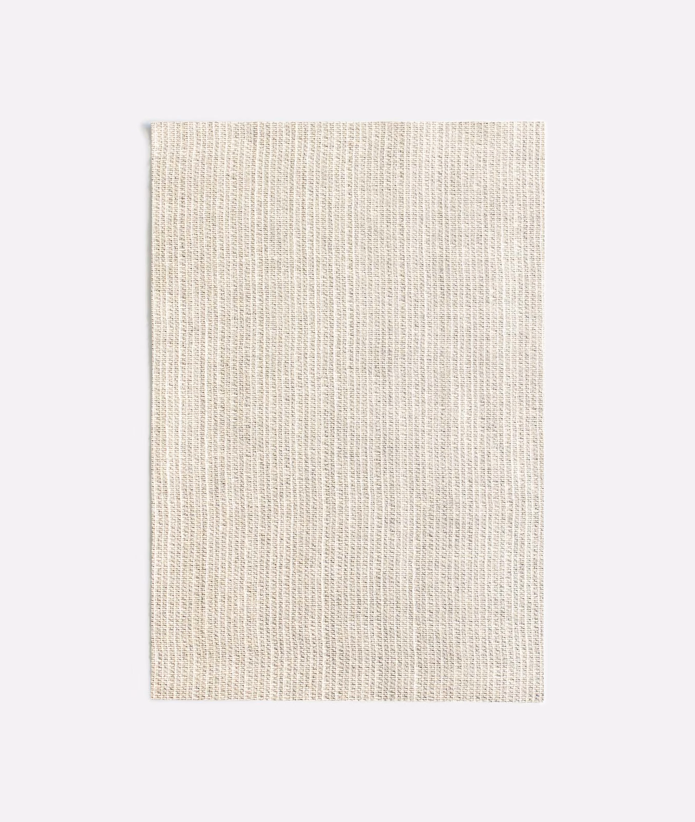 Soft ivory Paloma Linen with fine vertical slubs and a lightly grainy weave