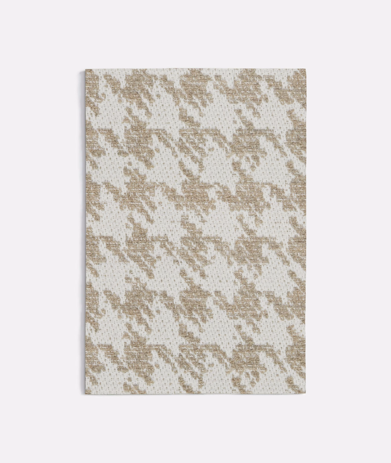 Warm beige houndstooth weave on an ivory textured fabric swatch