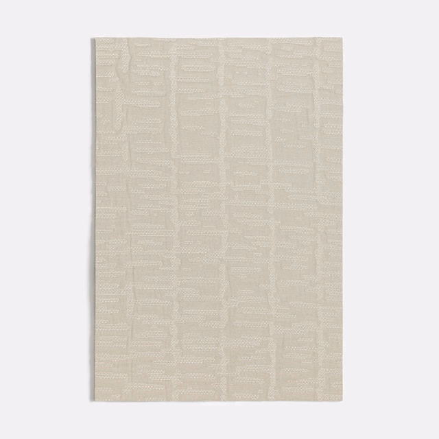 Pale greige-grey textile with subtle stepped marks and vertical woven bands