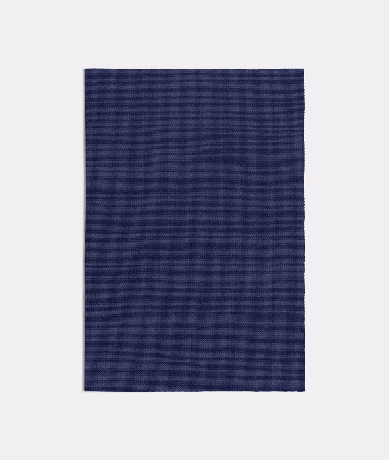 Deep ink-blue plain weave swatch showing fine crosshatch texture and a matte surface