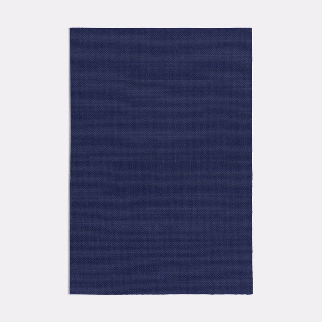 Deep ink-blue plain weave swatch showing fine crosshatch texture and a matte surface