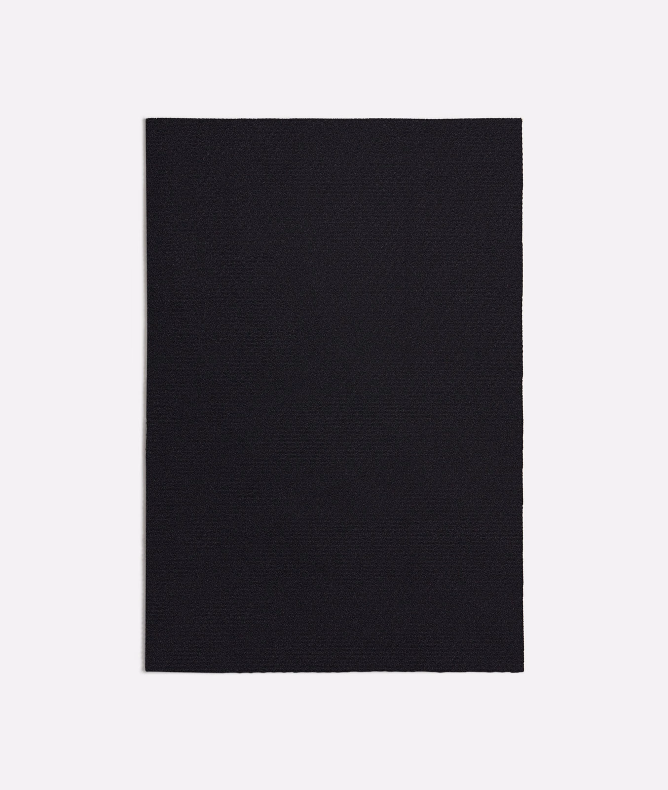 Near-black Quercia swatch showing a fine, subtly textured woven surface