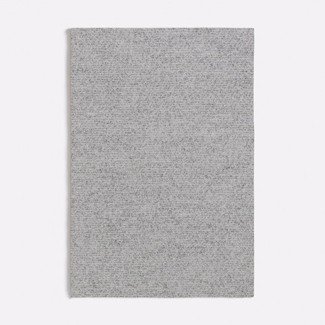Cool light-grey swatch with a fine, softly flecked woven texture