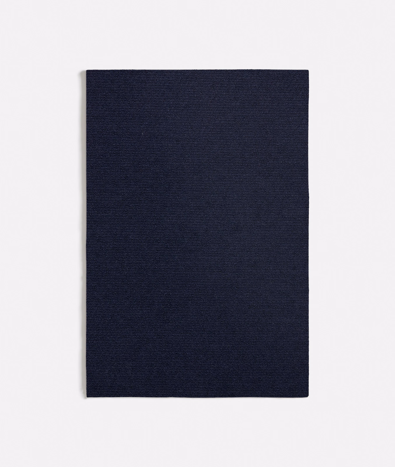 Deep navy textile swatch with a subtle, tightly woven horizontal grain