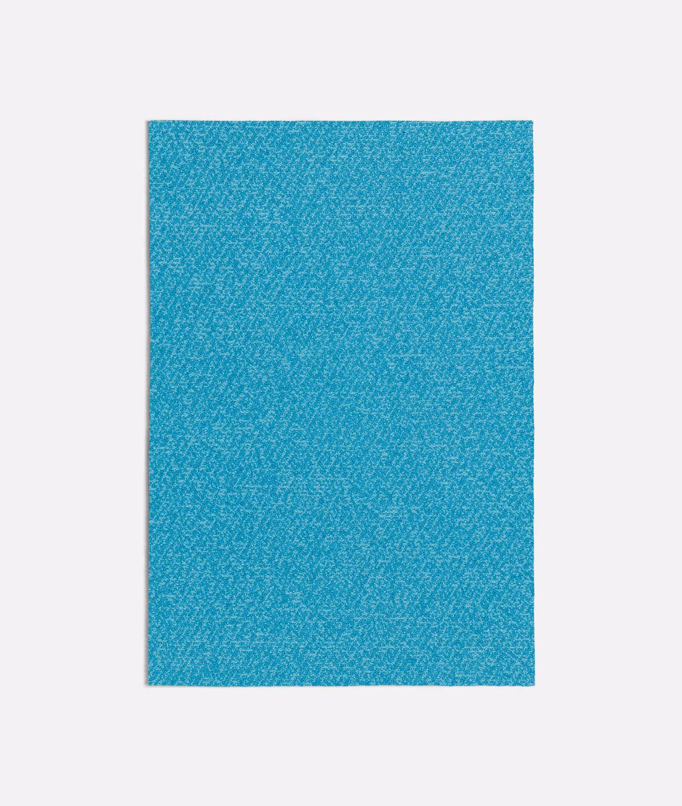 Cool turquoise woven swatch with a densely flecked, lightly directional texture