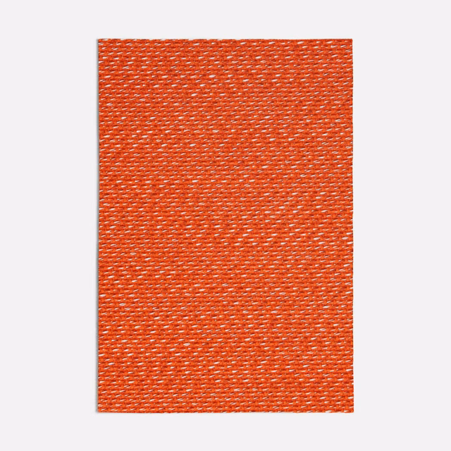 Red-orange woven swatch with fine pale flecks and a tactile basket texture