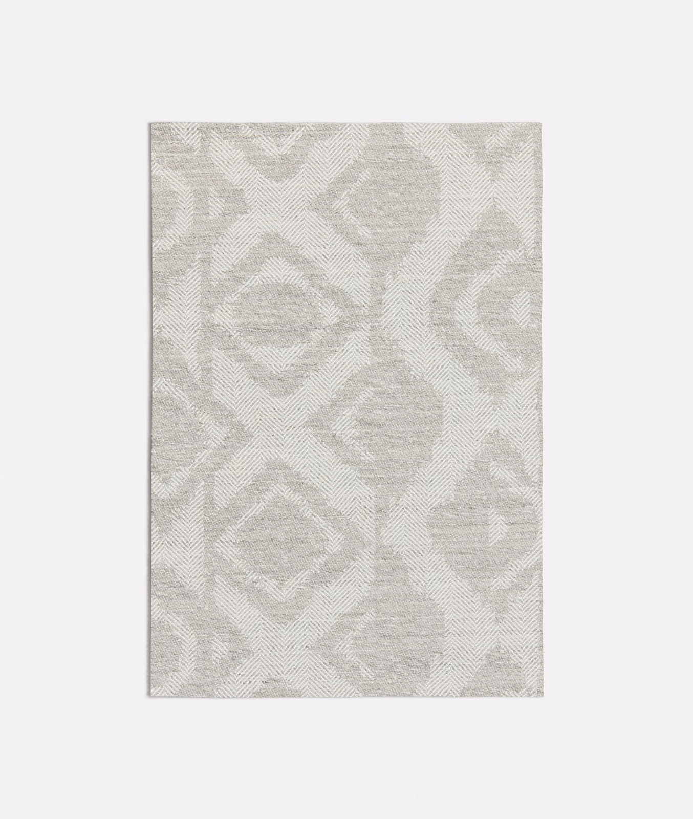 Pale Rancho Grey woven swatch with ivory geometric medallions and textured diagonal weave