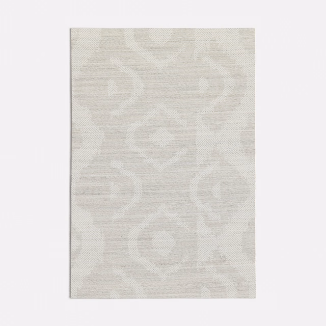 Pale grey woven swatch with oversized softly contrasting circular and scrolling motifs