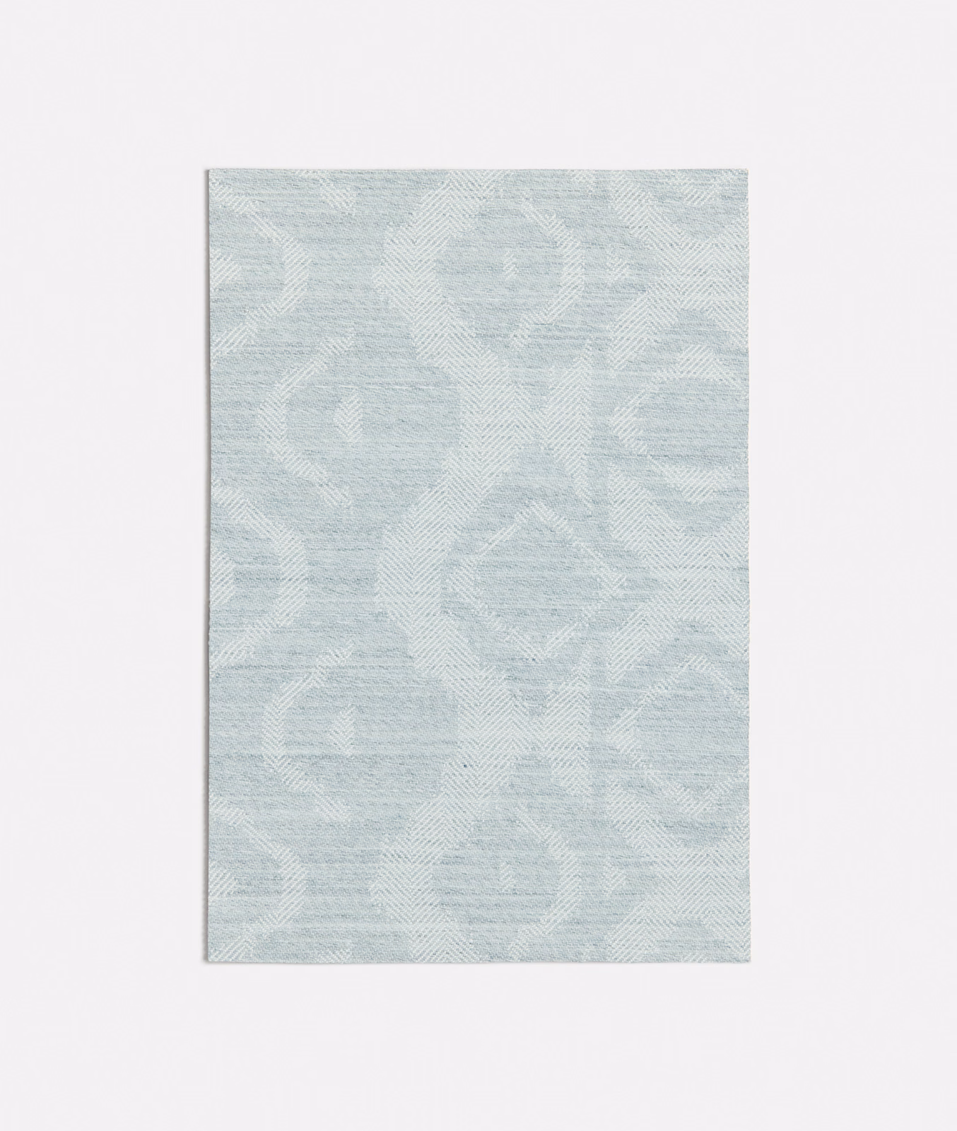 Pale seafoam woven textile with large low-contrast scrolling motifs and fine horizontal texture