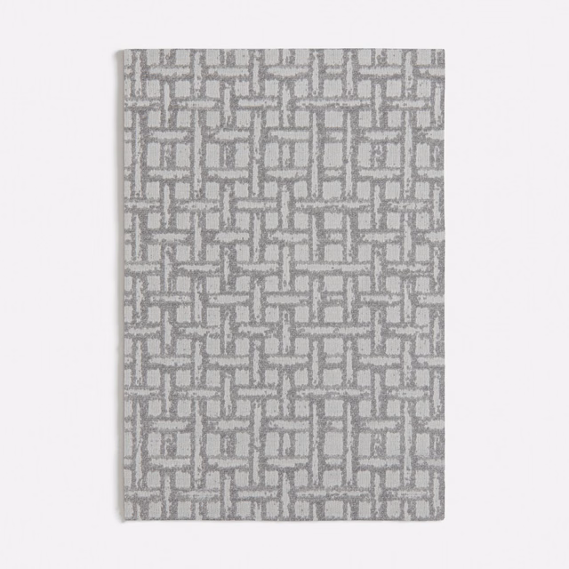 Warm grey woven swatch with small interlocking rectangular rattan-style geometric pattern