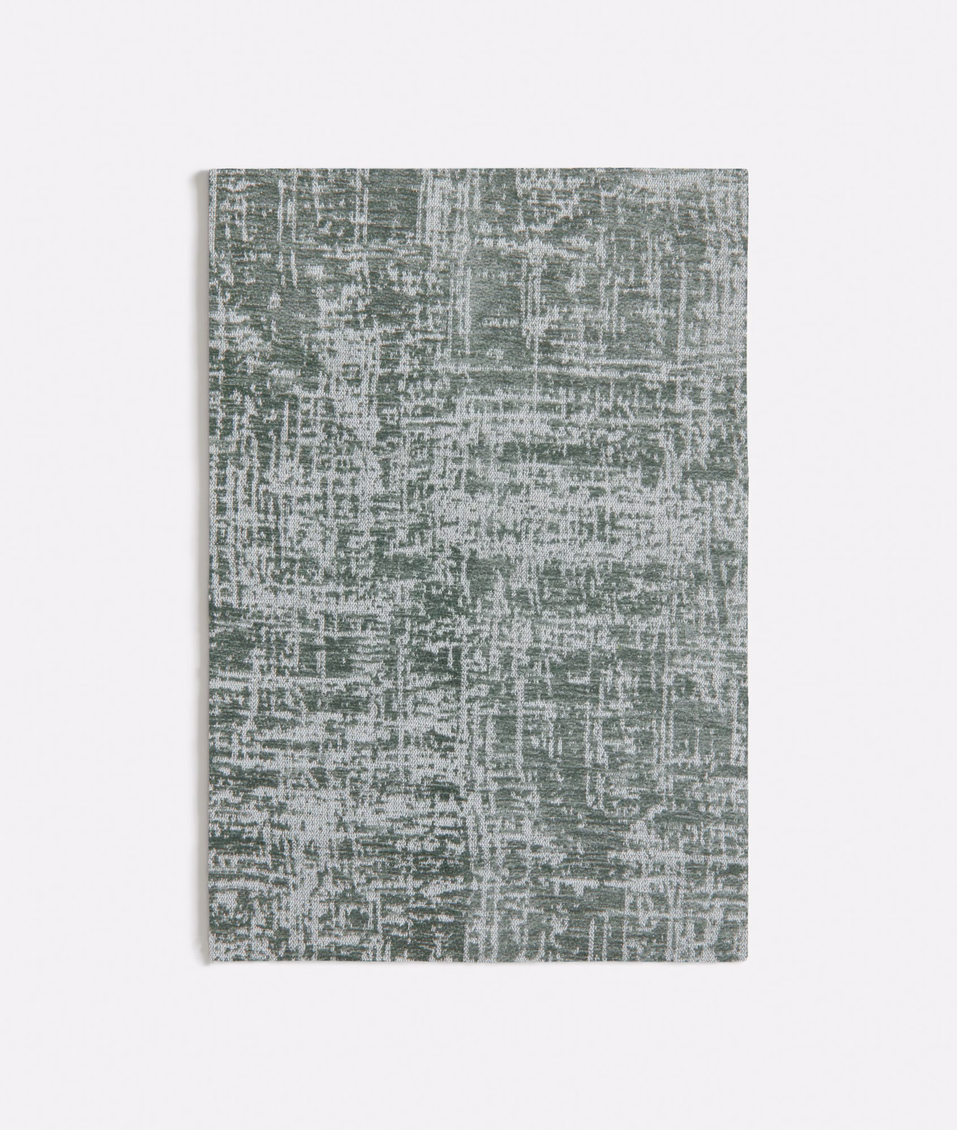 Muted raw green textile with chalky grey crosshatch and distressed linear texture