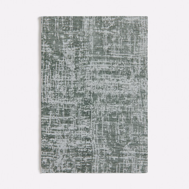 Muted raw green textile with chalky grey crosshatch and distressed linear texture