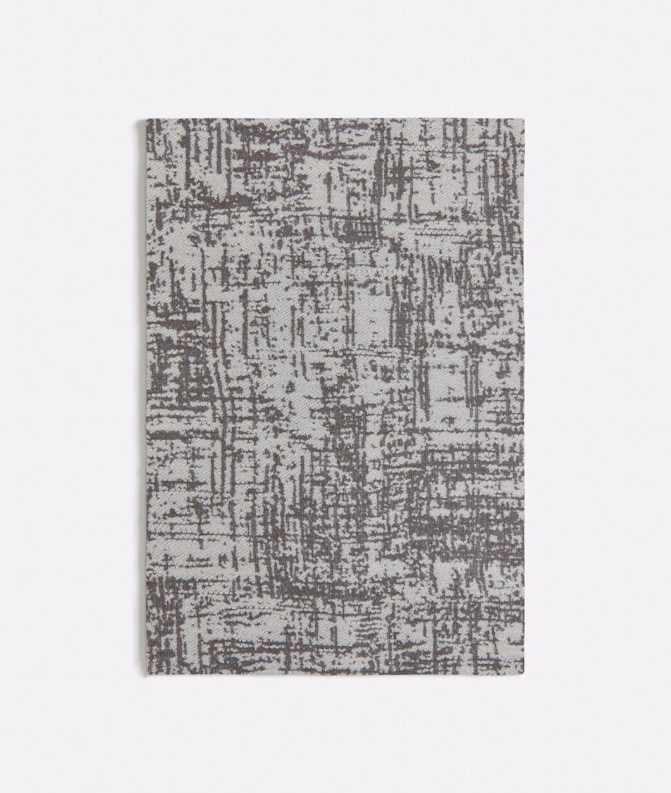Taupe textile swatch with dense charcoal-grey distressed grid and linear marks