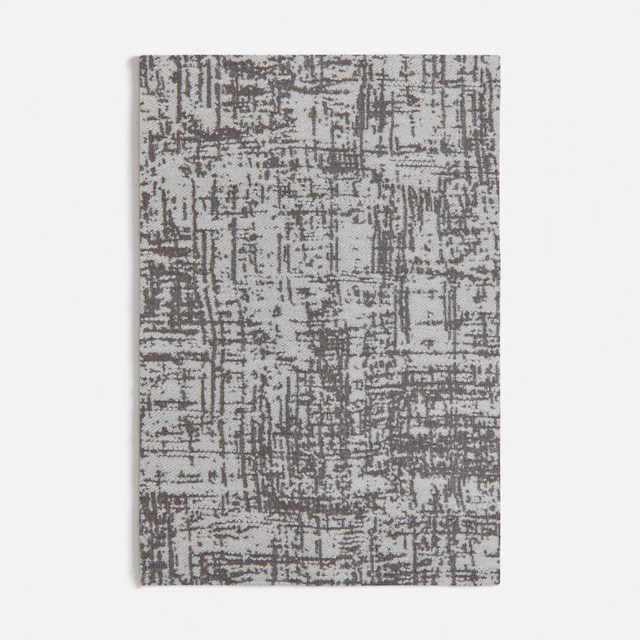 Taupe textile swatch with dense charcoal-grey distressed grid and linear marks