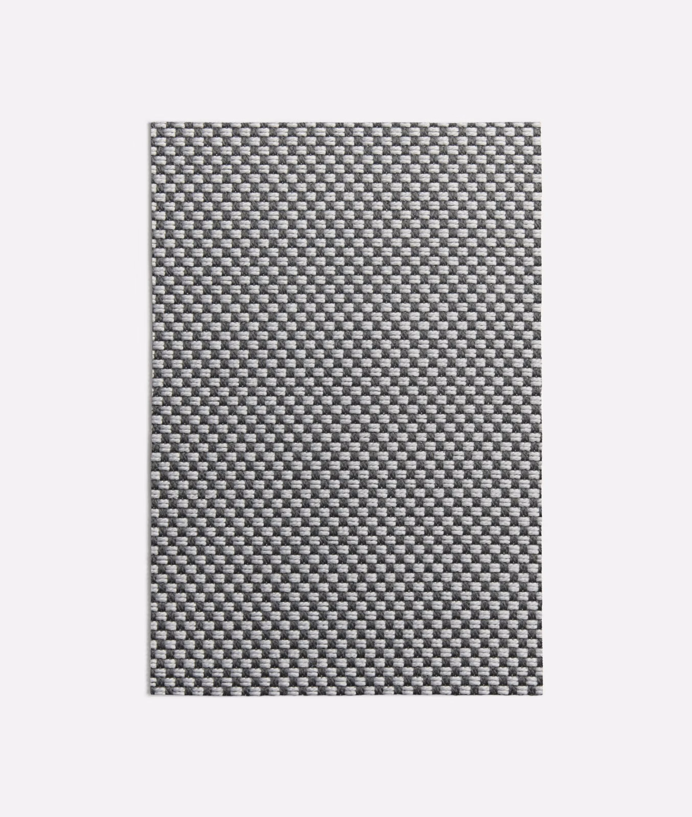 Close view of a charcoal and mid-grey micro-check woven textile