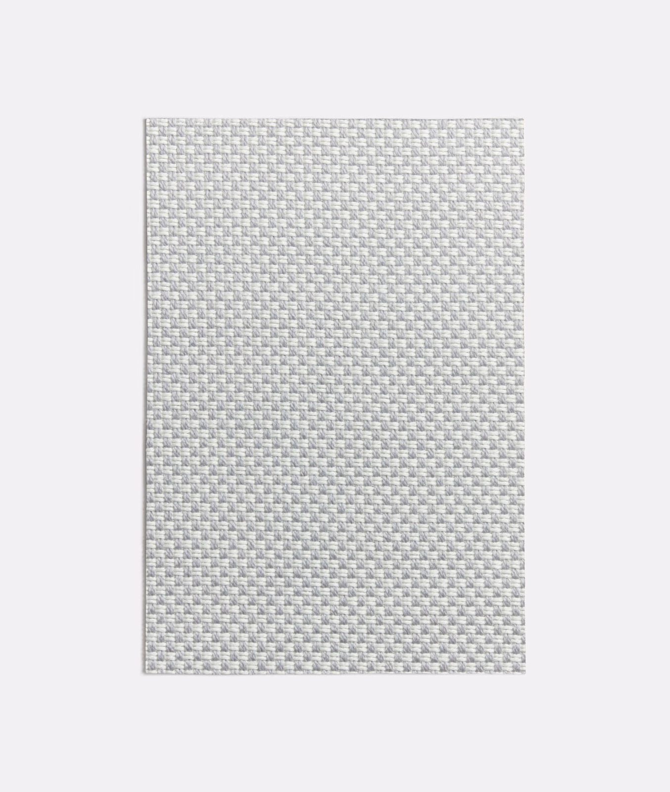 Pale cool-grey textile with a dense tiny checked weave and softly mottled texture