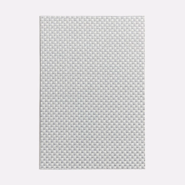 Pale cool-grey textile with a dense tiny checked weave and softly mottled texture