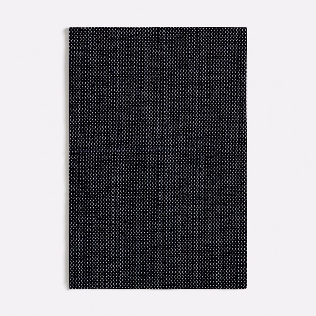 Deep navy chenille swatch with a fine, tightly dotted woven texture