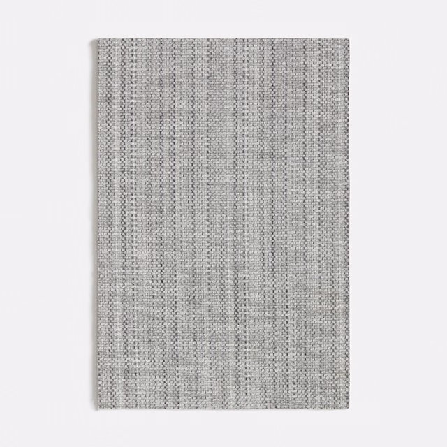 Cool grey chenille swatch with fine vertical ribbing and heathered texture