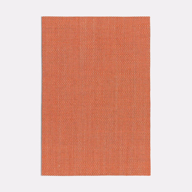 Burnt orange fabric with a fine, closely spaced pale fleck weave
